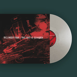 Mock up of vinyl and cover art for this shit is geniuser.  Metallic silver record coming out of the cover.  Cover art is a red pohtographic image on a black background of musical equipment chaotically left on a stage.